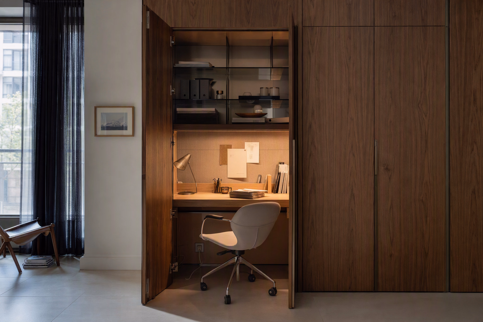 Integrated cedar workspace opened within full-height apartment joinery